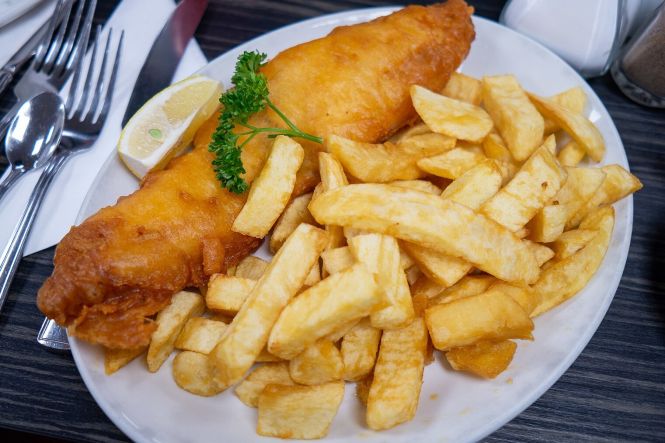 Fish and chips blackpool. Photo by Matthias Meckel . Cropped from original. License: CC BY-SA 4.0