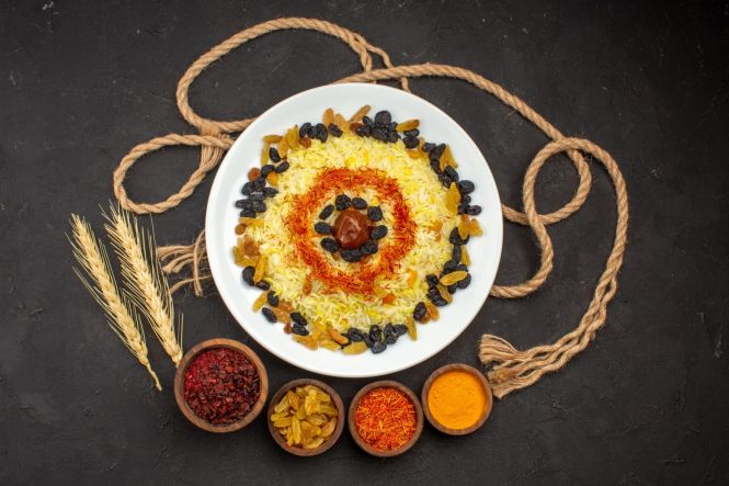 Pongal, traditional Indian food. Image by KamranAydinov, from Freepik