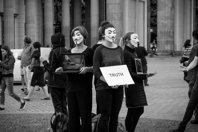 Truth - Anonymous protesters. Photo by Florian Glawogger from Unsplash