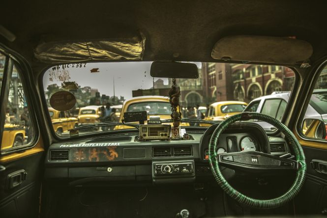 A cab in Kolkata. Photo by rajat sarki on Unsplash