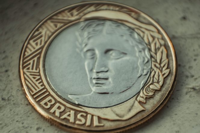 Imagem de uma moeda. Foto: Orlando Sant'Anna, Unsplash